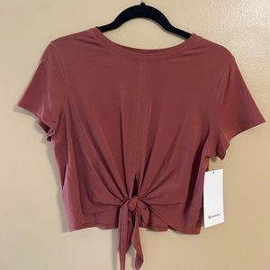 Dusty orange Lulu Lemon Time To Restore tie top.